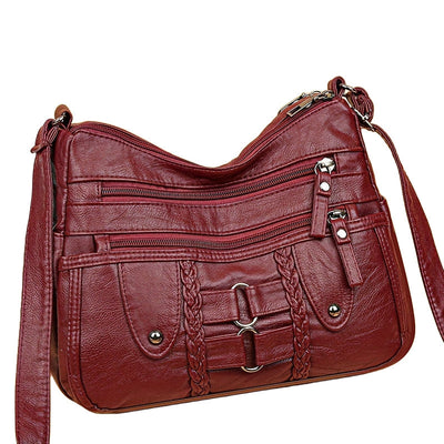 Jody Crossbody mit Nietenbesatz | Anti-Diebstahl Crossbody Tasche