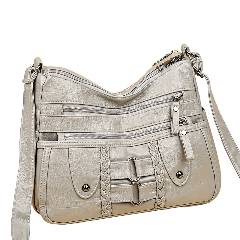 Jody Crossbody mit Nietenbesatz | Anti-Diebstahl Crossbody Tasche