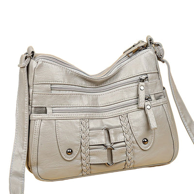 Jody Crossbody mit Nietenbesatz | Anti-Diebstahl Crossbody Tasche