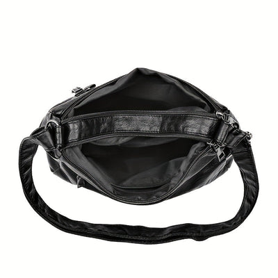 Jody Crossbody mit Nietenbesatz | Anti-Diebstahl Crossbody Tasche