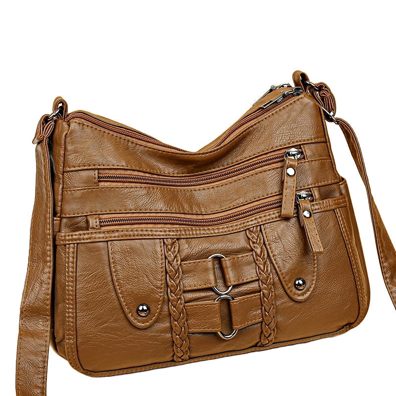 Jody Crossbody mit Nietenbesatz | Anti-Diebstahl Crossbody Tasche