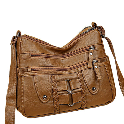 Jody Crossbody mit Nietenbesatz | Anti-Diebstahl Crossbody Tasche
