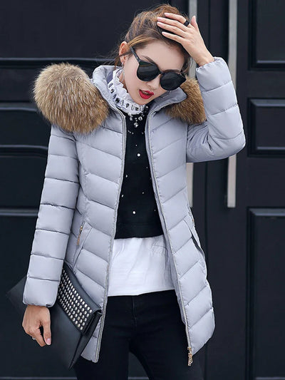 Cece - Lange Pelzjacke mit Puffs