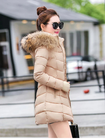 Cece - Lange Pelzjacke mit Puffs