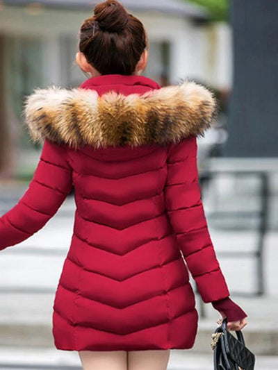 Cece - Lange Pelzjacke mit Puffs