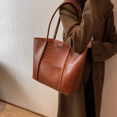 Imane | Vintage Umhängetasche aus braunem Leder mit Hakendruck
