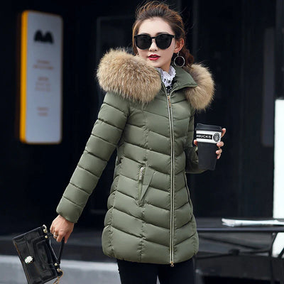 Cece - Lange Pelzjacke mit Puffs