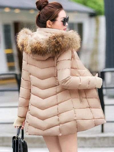 Cece - Lange Pelzjacke mit Puffs