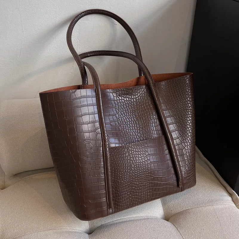 Imane | Vintage Umhängetasche aus braunem Leder mit Hakendruck