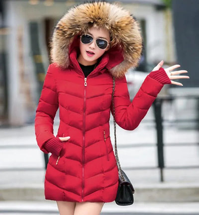 Cece - Lange Pelzjacke mit Puffs