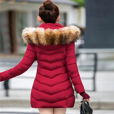 Cece - Lange Pelzjacke mit Puffs