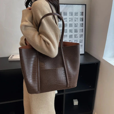 Imane | Vintage Umhängetasche aus braunem Leder mit Hakendruck