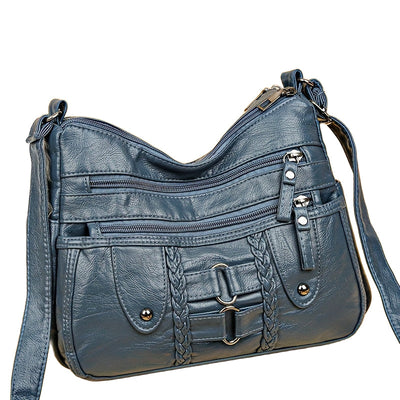 Jody Crossbody mit Nietenbesatz | Anti-Diebstahl Crossbody Tasche