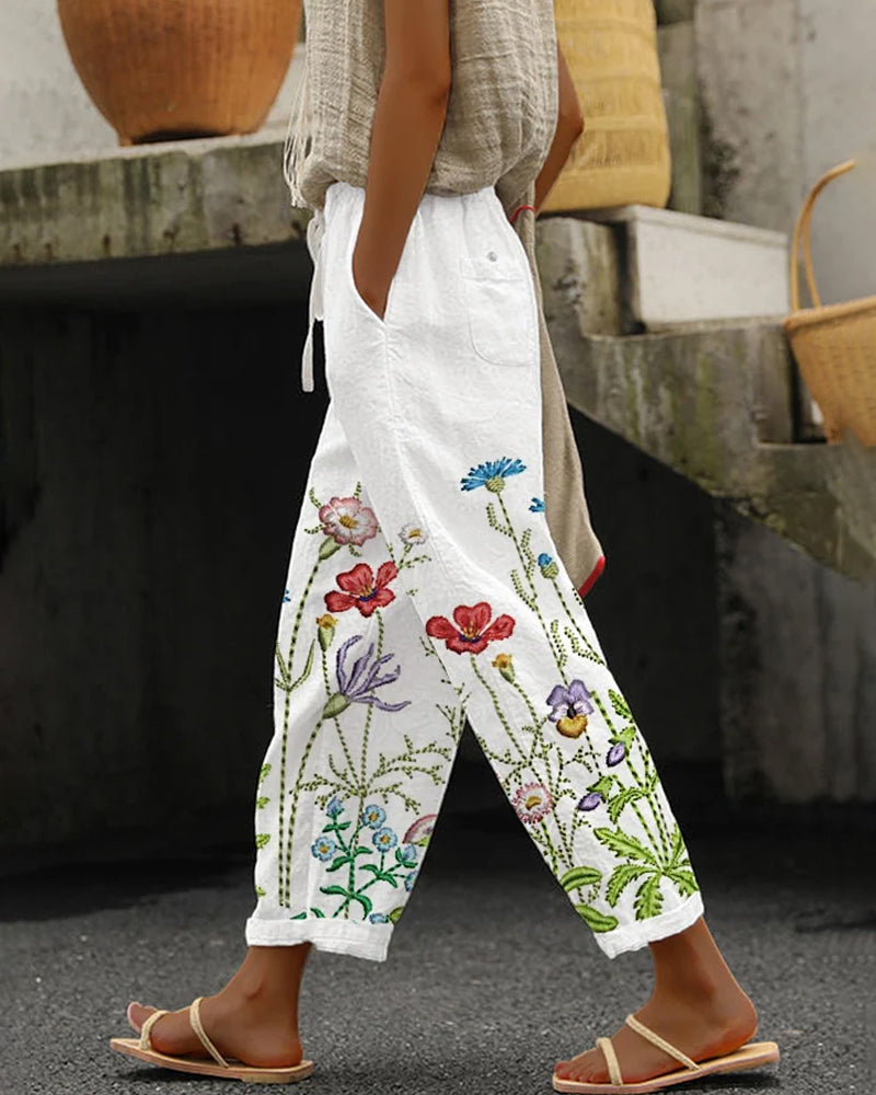 Pantaloni casual con stampa floreale con tasche