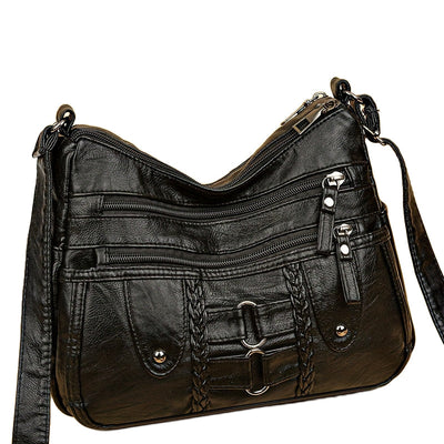 Jody Crossbody mit Nietenbesatz | Anti-Diebstahl Crossbody Tasche