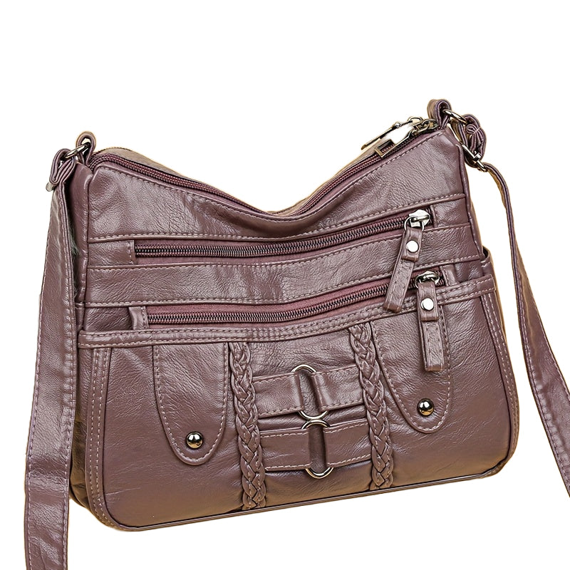 Jody Crossbody mit Nietenbesatz | Anti-Diebstahl Crossbody Tasche