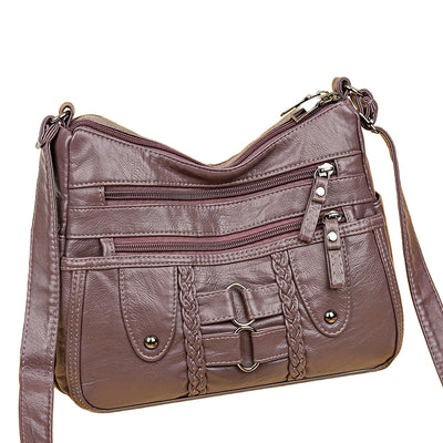 Jody Crossbody mit Nietenbesatz | Anti-Diebstahl Crossbody Tasche